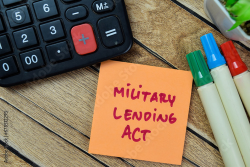 Εκτύπωση καμβά Concept of Military Lending Act write on sticky notes isolated on Wooden Table
