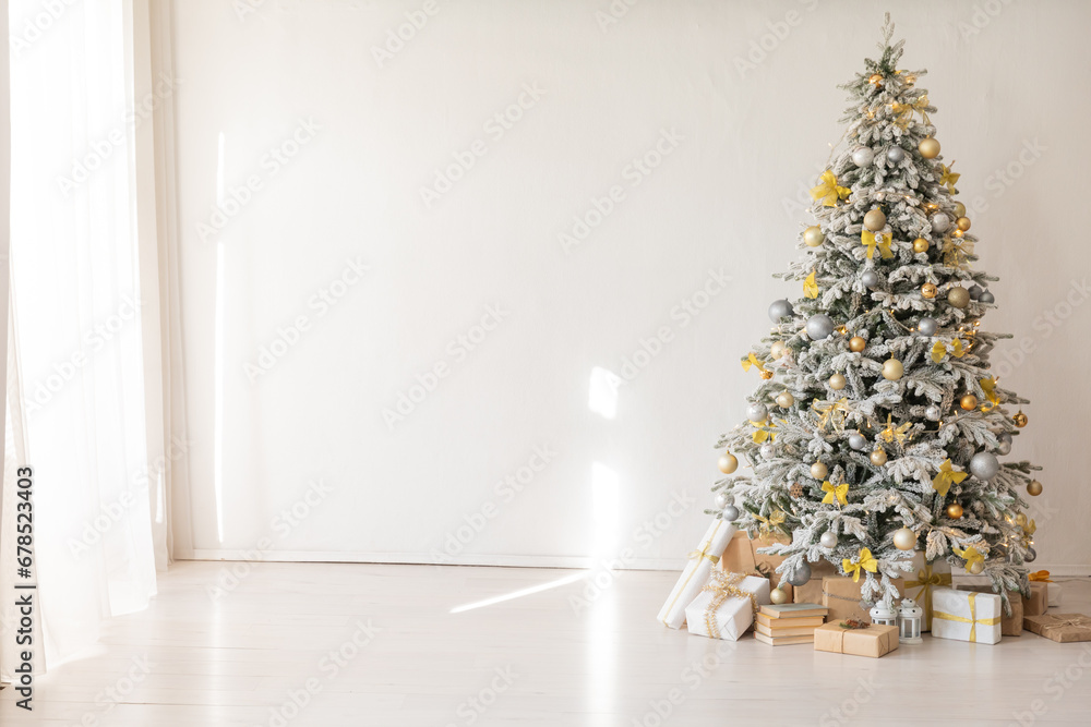 Christmas tree with gifts decorated with toys for new year