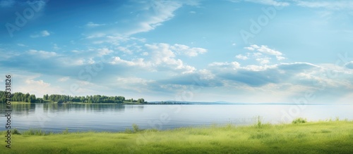 Summer lakeshore with lush grass