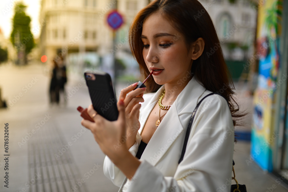 Young woman wearing sunglasses in city, colorful buildings and feel the warm. Exploring this bustling metropolis is a true adventure Young woman wearing sunglasses in city, colorful buildings and feel the warm. Exploring this bustling metropolis is a true adventure