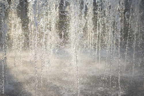 The background image of the river showing movement of fountain in the city © yongyut