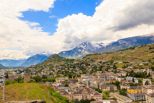 Panoramic view from a hill over City of Sion with and Swiss Alps in Canton Valais, Switzerland