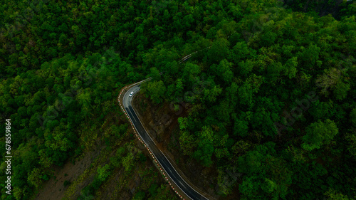 aerial view of road turn in the mountains