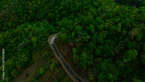 aerial view of road  turn in the mountains