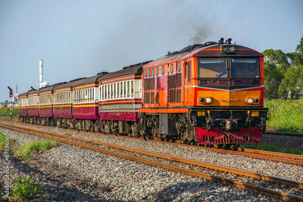 Passenger train by diesel locomotive on the railway. Passenger train by diesel locomotive on the railway.