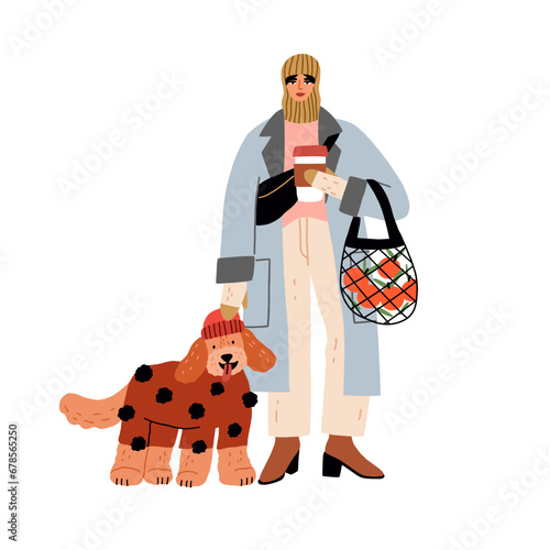 Woman with coffee cup and cute dog on winter holidays. Fashion stylish girl w...
