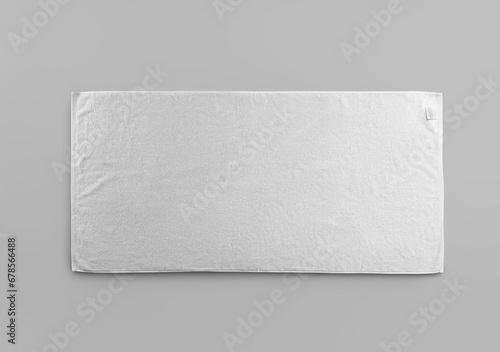 Mockup of white terry towel with label isolated on background.