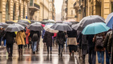 Crowd Walking with Umbrellas on Rainy Day
