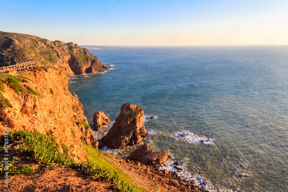 View of the Atlantic Ocean from Cabo da Roca. Cabo da Roca or Cape Roca is westernmost cape of mainland Portugal, continental Europe and the Eurasian land mass