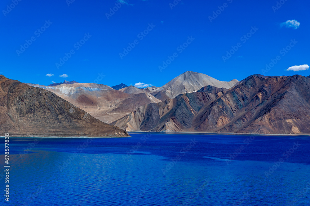 Landscape with mountains on the lake named Pagong Tso or Pagong Lake, situated on the border with India and China, Leh, Ladakh, India.  one of the world's highest brackish water lakes.