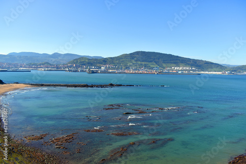 Arrigunaga beach in Getxo. In the background, Santurce / Santurtzi. Bizkaia. Basque Country. Spain photo