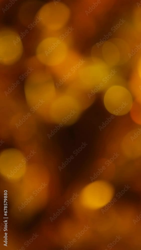 vertical video of gold bokeh background vertical video of gold bokeh background