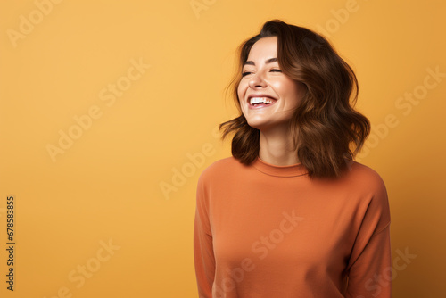 Radiant Glow: Happy Young Woman Gazing Away with a Joyful Smile, Standing Confidently in a Studio Background, Capturing a Moment of Contentment