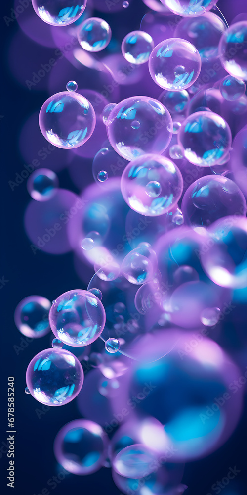 Transparent abstract soap bubbles on bpurplelue background 