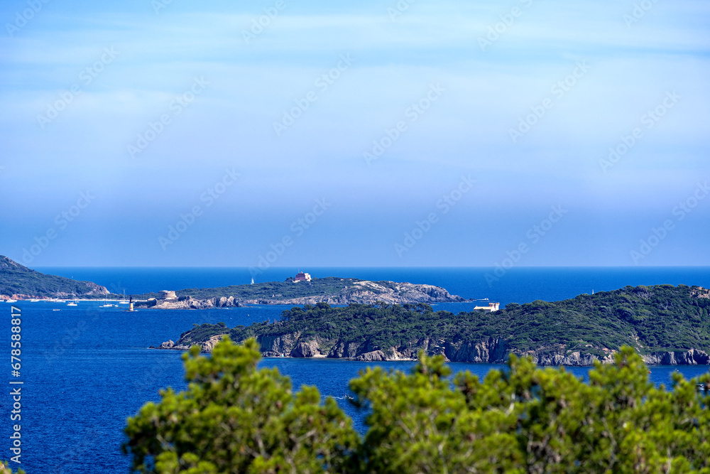 Aerial view from Giens Peninsula with Mediterranean Sea and sailing boats in the background on a sunny late spring day. Photo taken June 10th, 2023, Giens, Hyères, France.