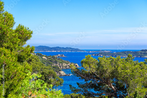 Fototapeta Naklejka Na Ścianę i Meble -  Aerial view from Giens Peninsula with Mediterranean Sea and sailing boats in the background on a sunny late spring day. Photo taken June 10th, 2023, Giens, Hyères, France.