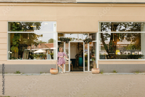 Owner standing outside zero waster store photo