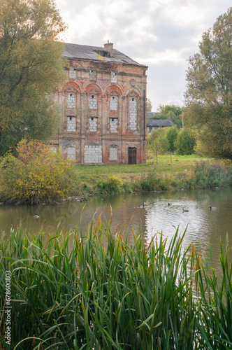 Old distillery in Minsk. House by the pond with ducks.