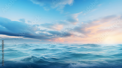 A mesmerizing image of the sea meeting the sky with a gradient of blues, from deep navy to soft cerulean, creating a tranquil and serene seascape.