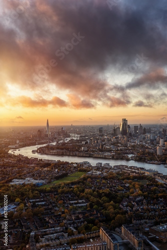Elevated view over the skyline of London, England, during a golden sunset