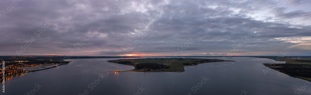 Aerial sunset panoramic view of Egholm, a Danish island in the Limfjord close to Aalborg.  It can be reached by ferry.