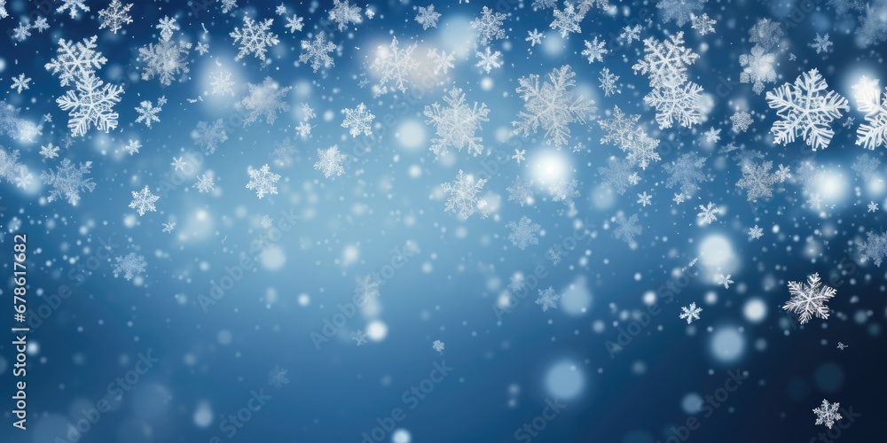 blue wallpaper background with snow and bokeh effect glitter
