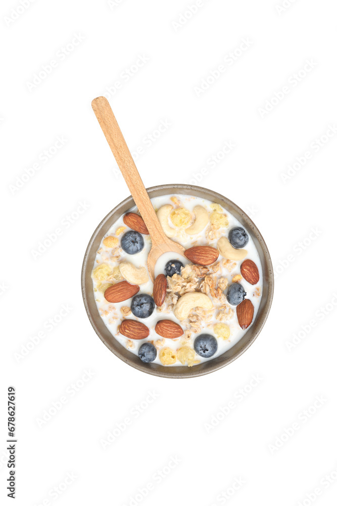 Muesli with yogurt, isolated on white background