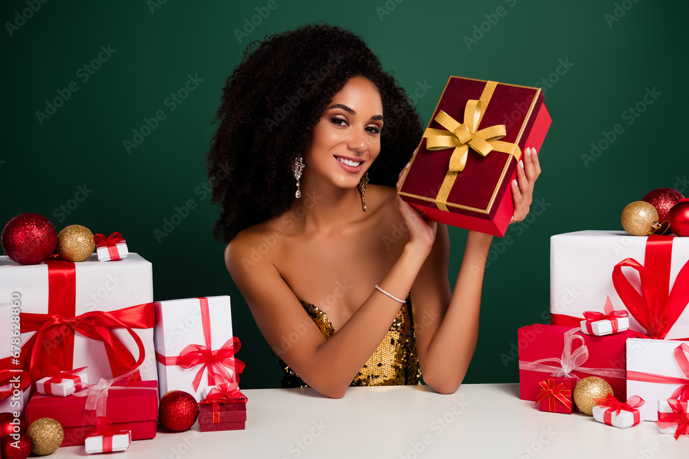 Photo of attractive chic lady on vip corporate party receive many christmas presents ove green background Photo of attractive chic lady on vip corporate party receive many christmas presents ove green background