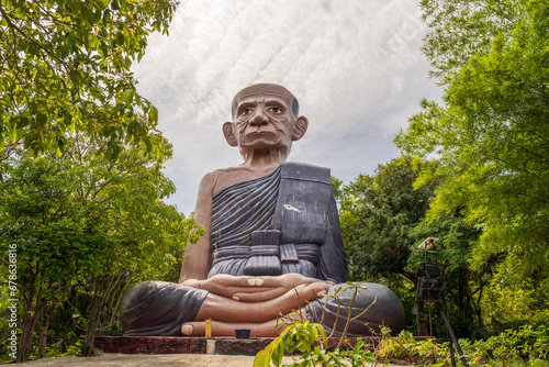 A Buddhist Statue at the Thai Island Koh Larn near Pattaya District Chonburi Southeast Asia photo