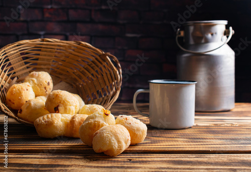 Cheese bread, delicious cheese breads from Brazil on rustic wood, selective focus. photo