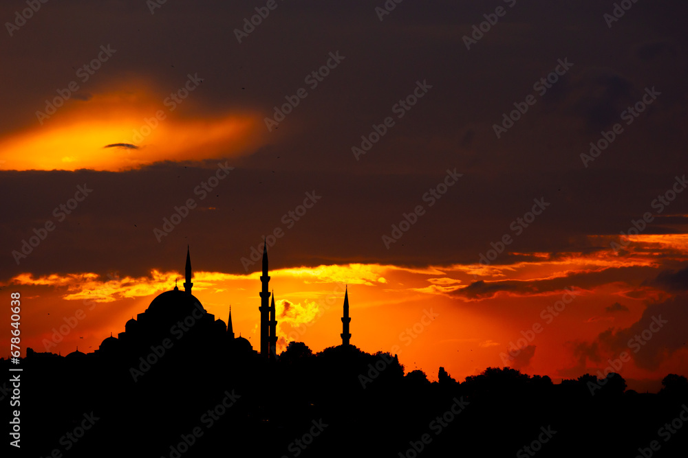 Islamic background photo. Silhouette of Suleymaniye Mosque at sunset
