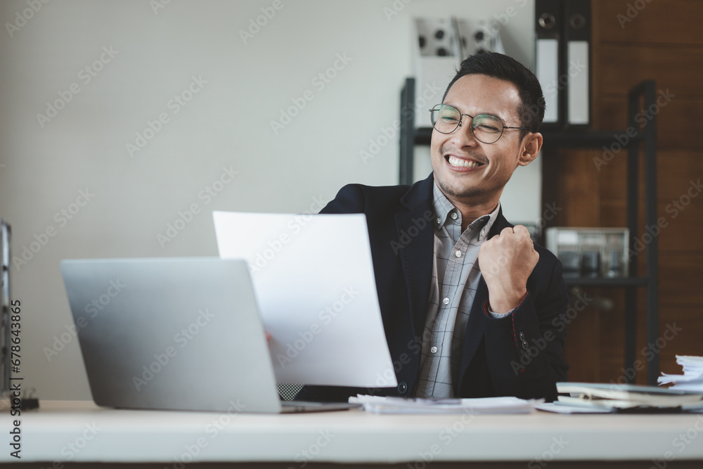 Cheerful due to success in work, Entrepreneurs joyful because business is prospering, Businessman working happily in office at company, Cheerful due to success in work, Entrepreneurs joyful because business is prospering, Businessman working happily in office at company,