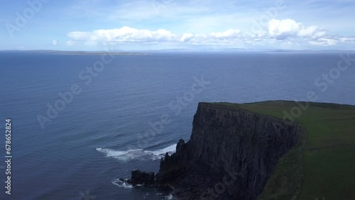 birds cliff sea stack