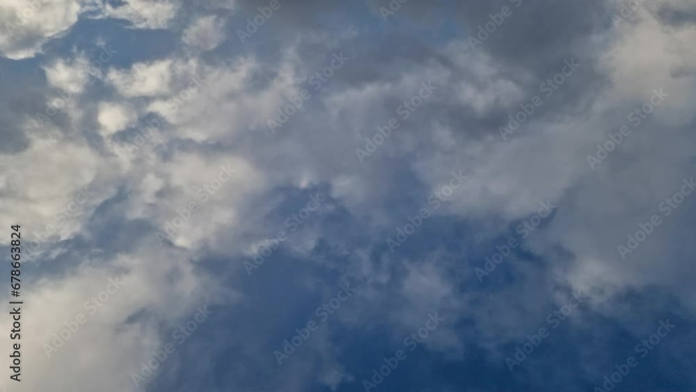 white clouds run across the blue sky. time lapse white clouds run across the blue sky. time lapse