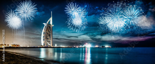 Photo fireworks around Burj Al Arab - exotic New Year destination, Dubai, UAE