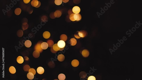 Christmas tree lights with nice bokeh top to bottom slide. High quality 4k footage