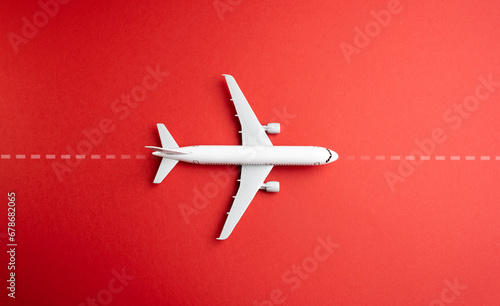 The plane follows the route. Air communication. Flights traffic. Routes and directions. Businessman or official with a plane. Civil aviation and commercial airlines.