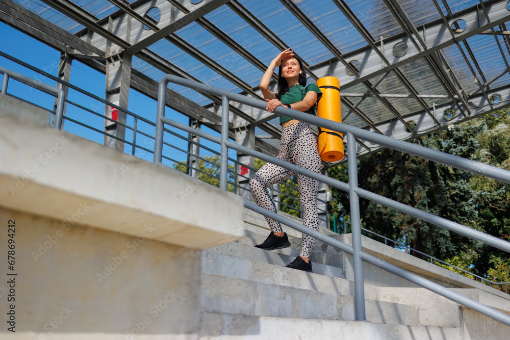 Fototapeta premium Athletic Lifestyle: Stadium Mat Exercise