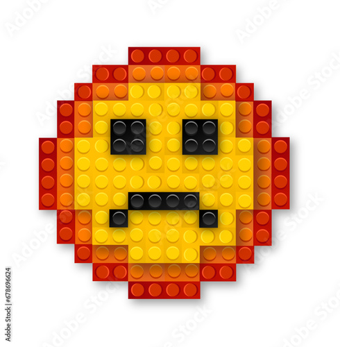 Sad smiley emoji icon made by lego toy blocks photo