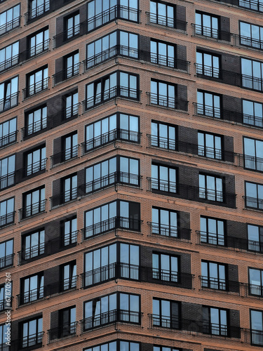 Windows of a modern apartment building in City.