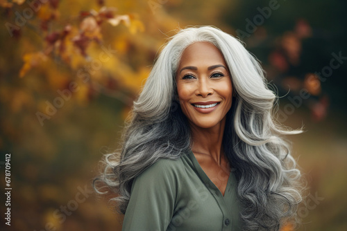 Generative AI technology picture of gorgeous grey haired woman walking autumn park