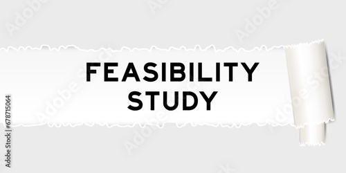 Ripped gray paper background that have word feasibility study under torn part