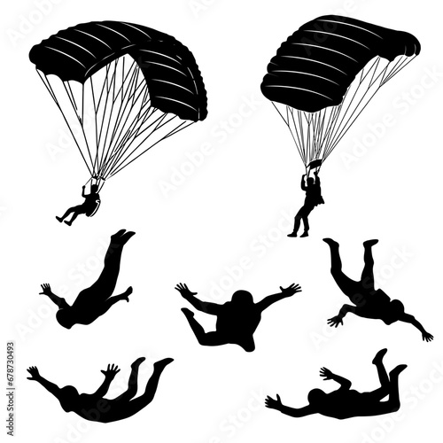silhouette of a paraglider