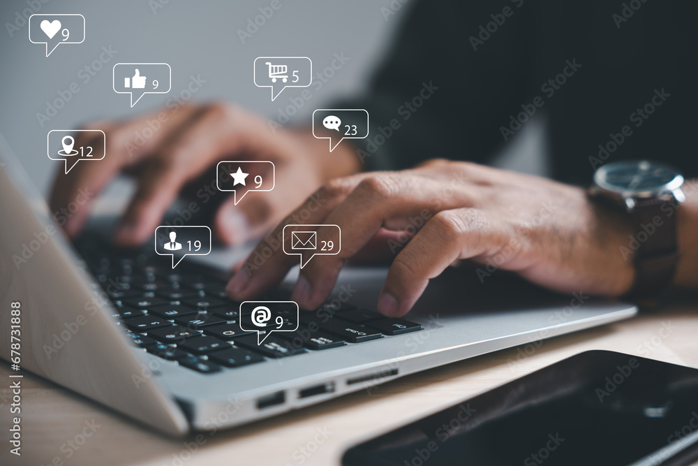 A young businessman works diligently on her laptop, utilizing the power of social media and online marketing strategies. The concept of modern business in a digital age is vividly portrayed. A young businessman works diligently on her laptop, utilizing the power of social media and online marketing strategies. The concept of modern business in a digital age is vividly portrayed.
