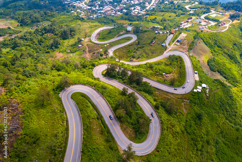 Top view Aerial photo from flying drone over Mountains and winding road mountain paths exciting steep at Phu Thap Boek ,Phetchabun Province,Thailand,ASIA. photo