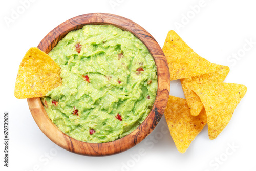 Guacamole sauce and tortilla chips, popular Mexican food  top view on white background. Clipping path.