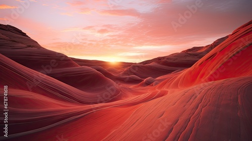  the sun is setting in the distance over a desert landscape with red sand dunes and sand dunes in the foreground, and a red and orange sky in the background. photo