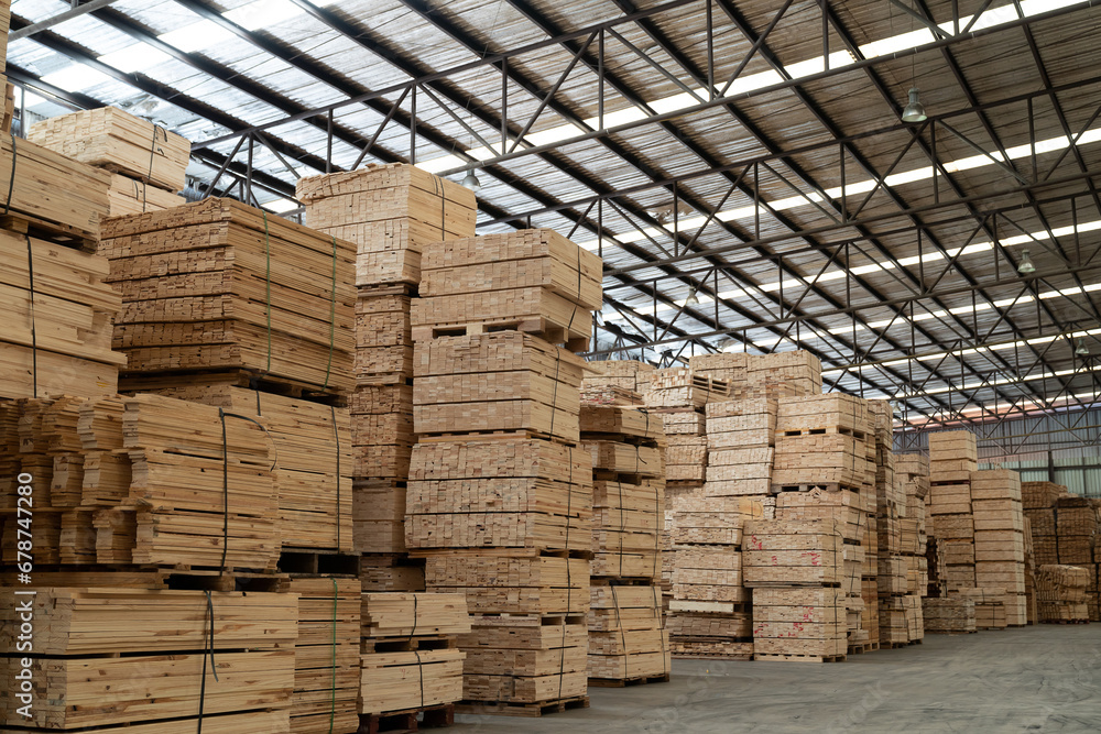 Pile of lumber in wooden warehouse storage. Pile of timber at warehouse storage. Pile of pallet in warehouse Pile of lumber in wooden warehouse storage. Pile of timber at warehouse storage. Pile of pallet in warehouse