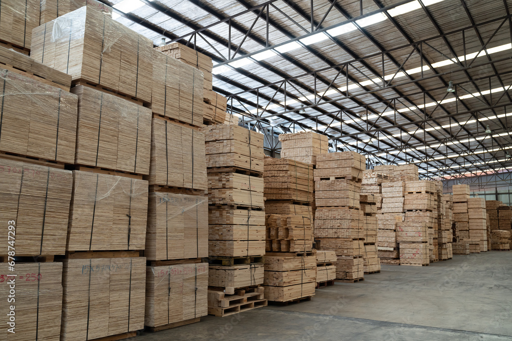 Pile of lumber in wooden warehouse storage. Pile of timber at warehouse storage. Pile of pallet in warehouse Pile of lumber in wooden warehouse storage. Pile of timber at warehouse storage. Pile of pallet in warehouse