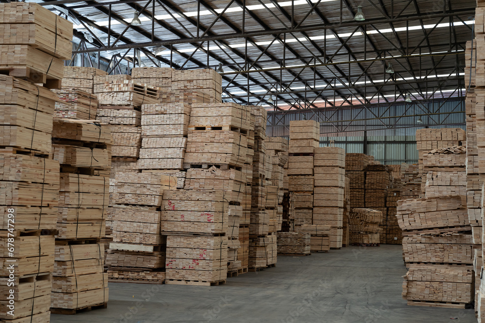 Pile of lumber in wooden warehouse storage. Pile of timber at warehouse storage. Pile of pallet in warehouse Pile of lumber in wooden warehouse storage. Pile of timber at warehouse storage. Pile of pallet in warehouse